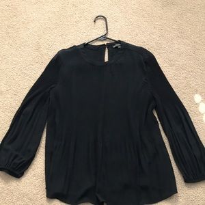 Adrianna Papell black blouse size S. Long sleeves, round neck.
